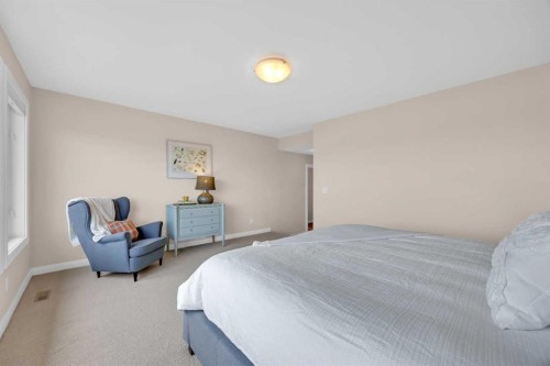 1 Westridge Way, Okotoks, AB - Indoor Photo Showing Bedroom