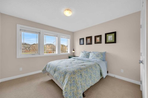 1 Westridge Way, Okotoks, AB - Indoor Photo Showing Bedroom