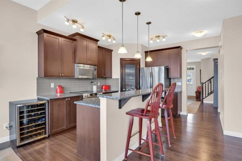 1 Westridge Way, Okotoks, AB - Indoor Photo Showing Kitchen With Upgraded Kitchen