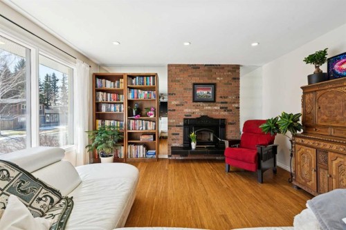 6608 Silverview Road Nw, Calgary, AB - Indoor Photo Showing Living Room With Fireplace