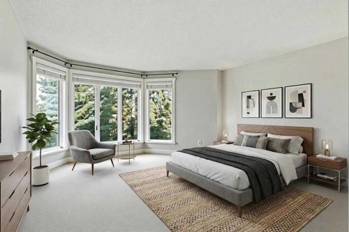 311 Coach Light Bay Sw, Calgary, AB - Indoor Photo Showing Bedroom