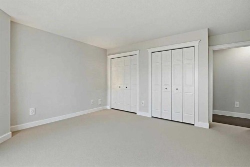 311 Coach Light Bay Sw, Calgary, AB - Indoor Photo Showing Other Room