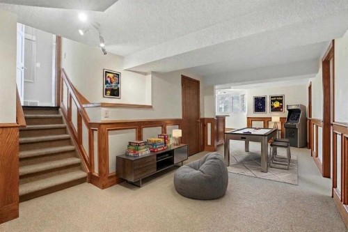 311 Coach Light Bay Sw, Calgary, AB - Indoor Photo Showing Other Room