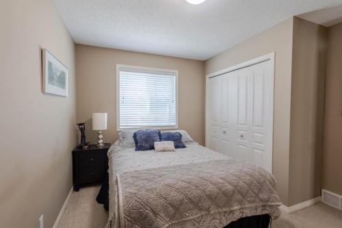 74 Valley Crest Rise Nw, Calgary, AB - Indoor Photo Showing Bedroom
