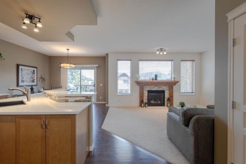 74 Valley Crest Rise Nw, Calgary, AB - Indoor Photo Showing Living Room With Fireplace