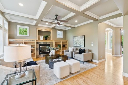38 Evergreen Common Sw, Calgary, AB - Indoor Photo Showing Living Room With Fireplace
