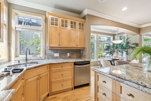 38 Evergreen Common Sw, Calgary, AB - Indoor Photo Showing Kitchen With Double Sink With Upgraded Kitchen