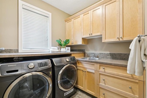38 Evergreen Common Sw, Calgary, AB - Indoor Photo Showing Laundry Room