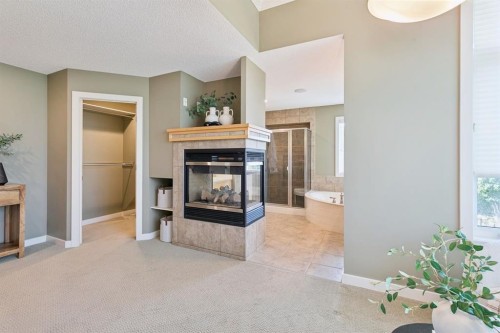 38 Evergreen Common Sw, Calgary, AB - Indoor With Fireplace