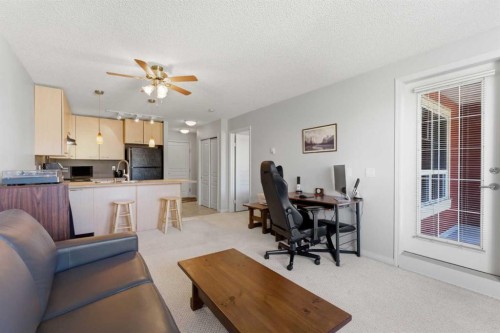 430-22 Richard Place Sw, Calgary, AB - Indoor Photo Showing Living Room