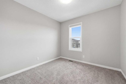 831 Wolf Willow Boulevard Se, Calgary, AB - Indoor Photo Showing Other Room