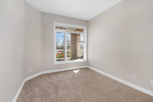 7204-14 Hemlock Crescent Sw, Calgary, AB - Indoor Photo Showing Other Room