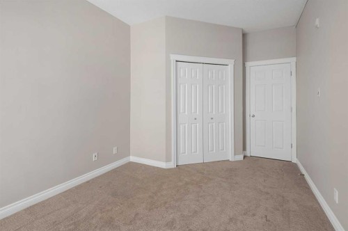 7204-14 Hemlock Crescent Sw, Calgary, AB - Indoor Photo Showing Other Room