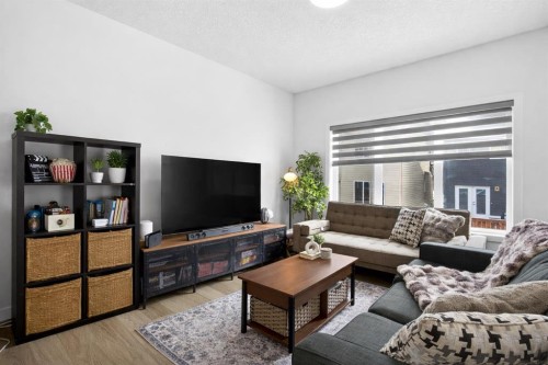48 Willow Green Sw, Airdrie, AB - Indoor Photo Showing Living Room