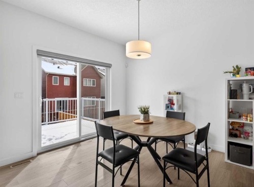 48 Willow Green Sw, Airdrie, AB - Indoor Photo Showing Dining Room