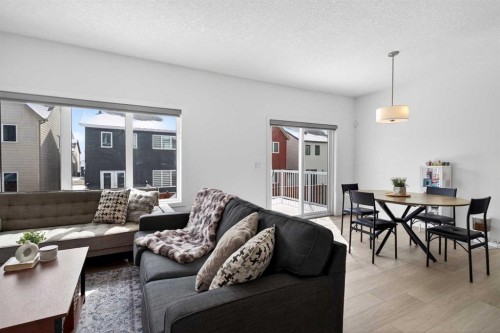 48 Willow Green Sw, Airdrie, AB - Indoor Photo Showing Living Room