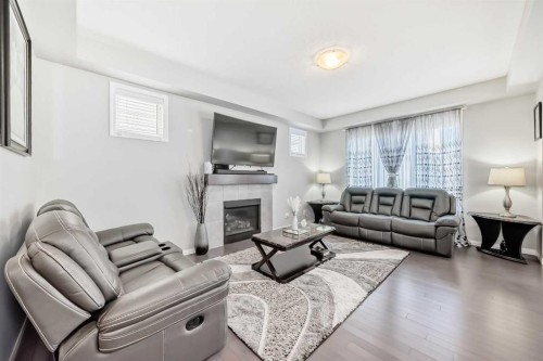 61 Cityscape View Ne, Calgary, AB - Indoor Photo Showing Living Room With Fireplace