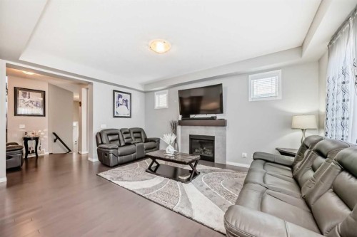 61 Cityscape View Ne, Calgary, AB - Indoor Photo Showing Living Room With Fireplace