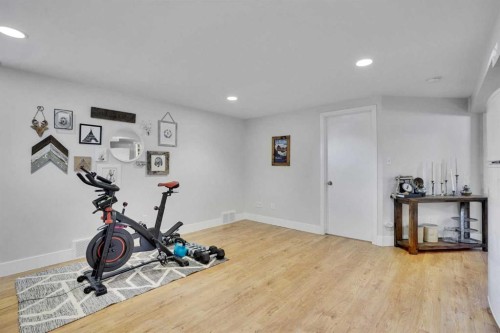 34 Malibou Road Sw, Calgary, AB - Indoor Photo Showing Gym Room