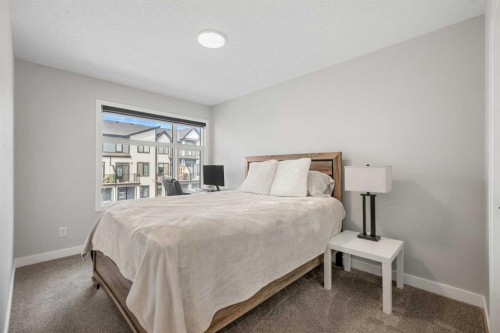 353 Seton Villas Se, Calgary, AB - Indoor Photo Showing Bedroom
