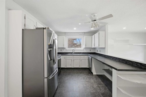 92 Whitlock Close Ne, Calgary, AB - Indoor Photo Showing Kitchen With Double Sink