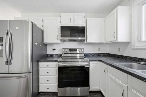 92 Whitlock Close Ne, Calgary, AB - Indoor Photo Showing Kitchen