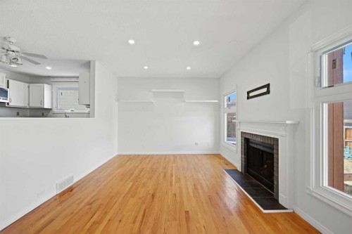 92 Whitlock Close Ne, Calgary, AB - Indoor With Fireplace