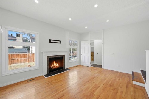 92 Whitlock Close Ne, Calgary, AB - Indoor Photo Showing Living Room With Fireplace