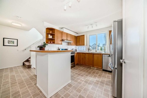 68 Tuscany Springs Way Nw, Calgary, AB - Indoor Photo Showing Kitchen