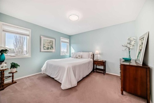68 Tuscany Springs Way Nw, Calgary, AB - Indoor Photo Showing Bedroom