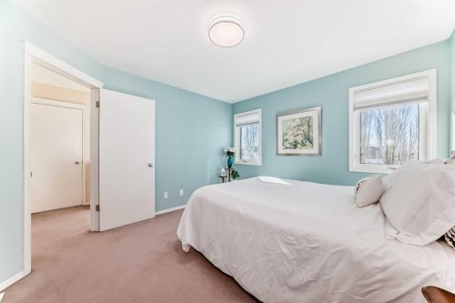 68 Tuscany Springs Way Nw, Calgary, AB - Indoor Photo Showing Bedroom