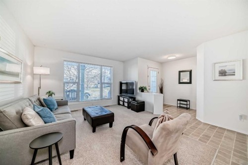 68 Tuscany Springs Way Nw, Calgary, AB - Indoor Photo Showing Living Room