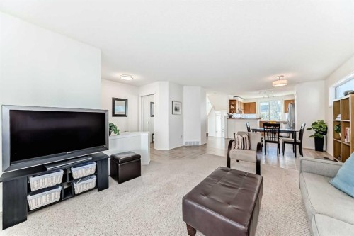 68 Tuscany Springs Way Nw, Calgary, AB - Indoor Photo Showing Living Room