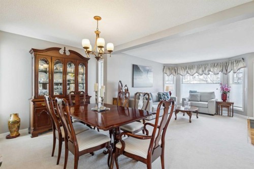 420 Rocky Ridge Bay Nw, Calgary, AB - Indoor Photo Showing Dining Room