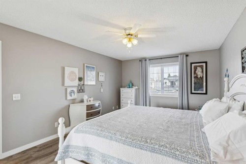 420 Rocky Ridge Bay Nw, Calgary, AB - Indoor Photo Showing Bedroom