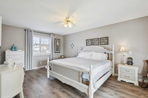 420 Rocky Ridge Bay Nw, Calgary, AB - Indoor Photo Showing Bedroom