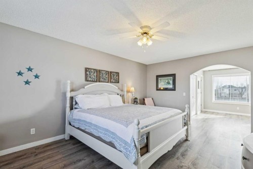 420 Rocky Ridge Bay Nw, Calgary, AB - Indoor Photo Showing Bedroom