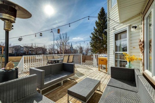 420 Rocky Ridge Bay Nw, Calgary, AB - Outdoor With Deck Patio Veranda With Exterior