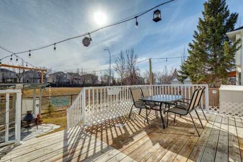 420 Rocky Ridge Bay Nw, Calgary, AB - Outdoor With Deck Patio Veranda