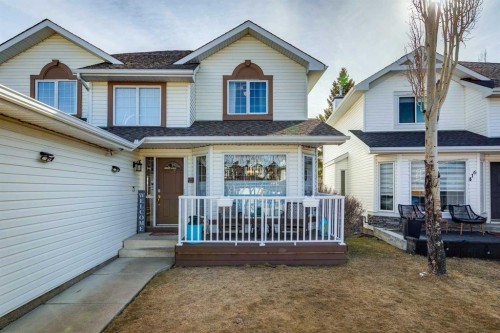 420 Rocky Ridge Bay Nw, Calgary, AB - Outdoor With Facade