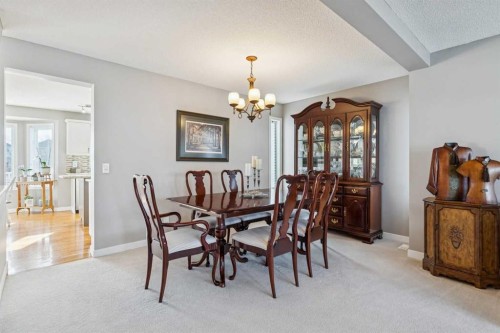 420 Rocky Ridge Bay Nw, Calgary, AB - Indoor Photo Showing Dining Room