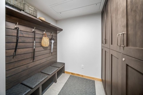 405-1408 Spring Creek Gate, Canmore, AB - Indoor Photo Showing Living Room With Fireplace