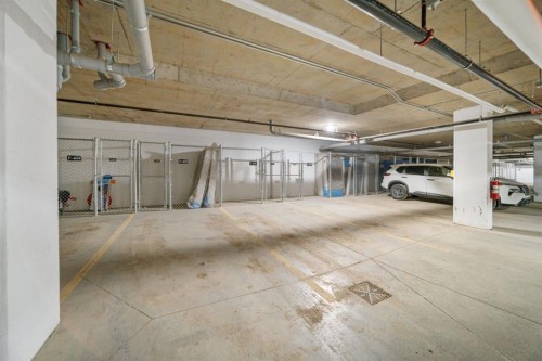 405-1408 Spring Creek Gate, Canmore, AB - Indoor Photo Showing Garage