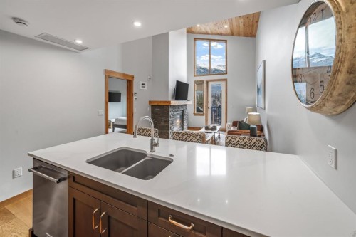 405-1408 Spring Creek Gate, Canmore, AB - Indoor Photo Showing Kitchen With Double Sink