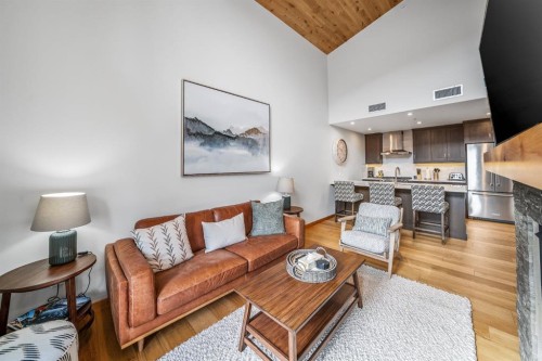 405-1408 Spring Creek Gate, Canmore, AB - Indoor Photo Showing Living Room