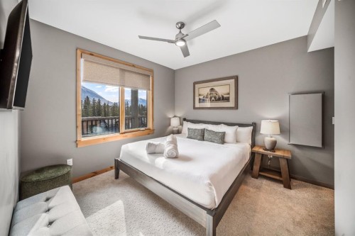 405-1408 Spring Creek Gate, Canmore, AB - Indoor Photo Showing Bedroom