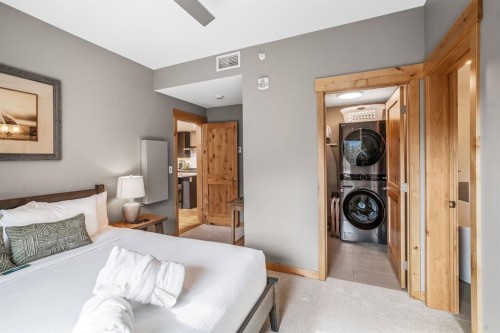 405-1408 Spring Creek Gate, Canmore, AB - Indoor Photo Showing Bedroom