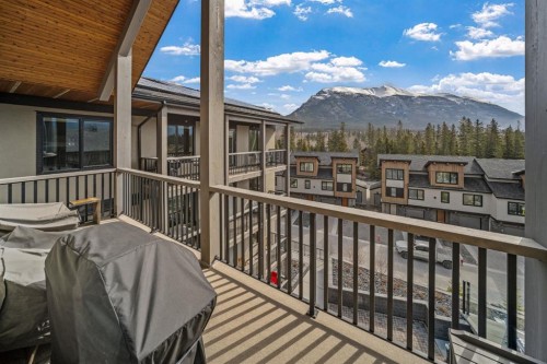 405-1408 Spring Creek Gate, Canmore, AB - Indoor Photo Showing Bedroom
