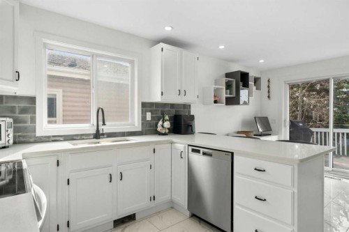107 Cedargrove Way Sw, Calgary, AB - Indoor Photo Showing Kitchen