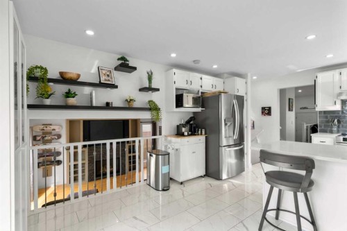 107 Cedargrove Way Sw, Calgary, AB - Indoor Photo Showing Kitchen